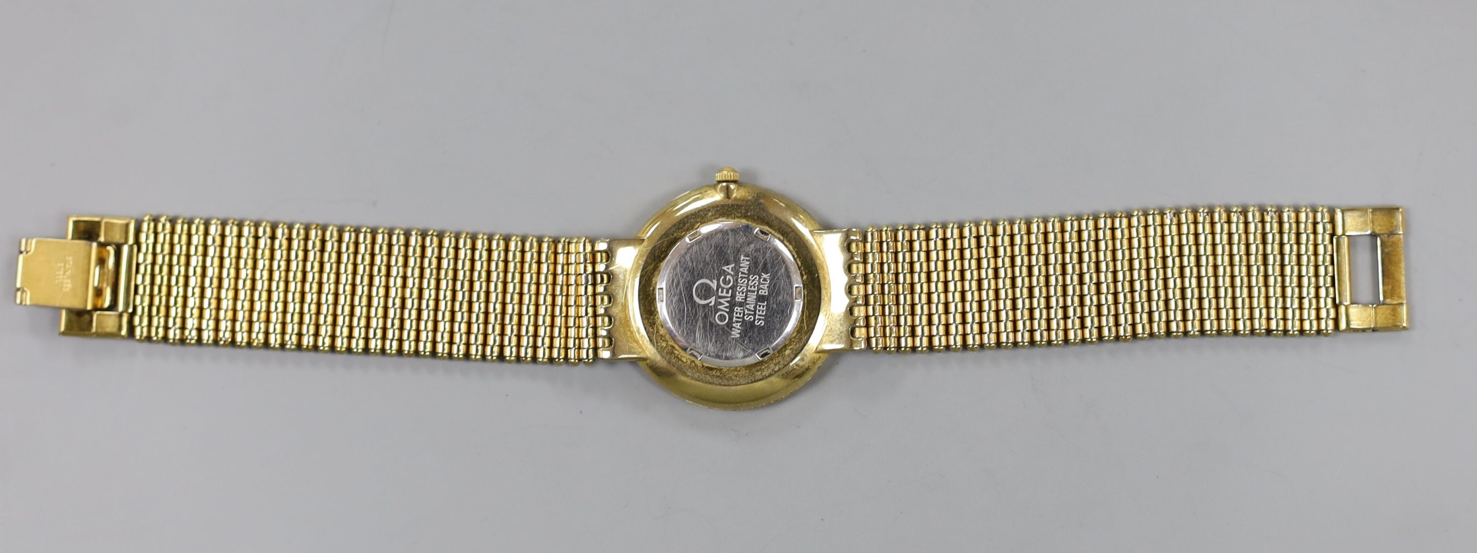 A gentleman's steel and gold plated Omega De Ville quartz wrist watch.